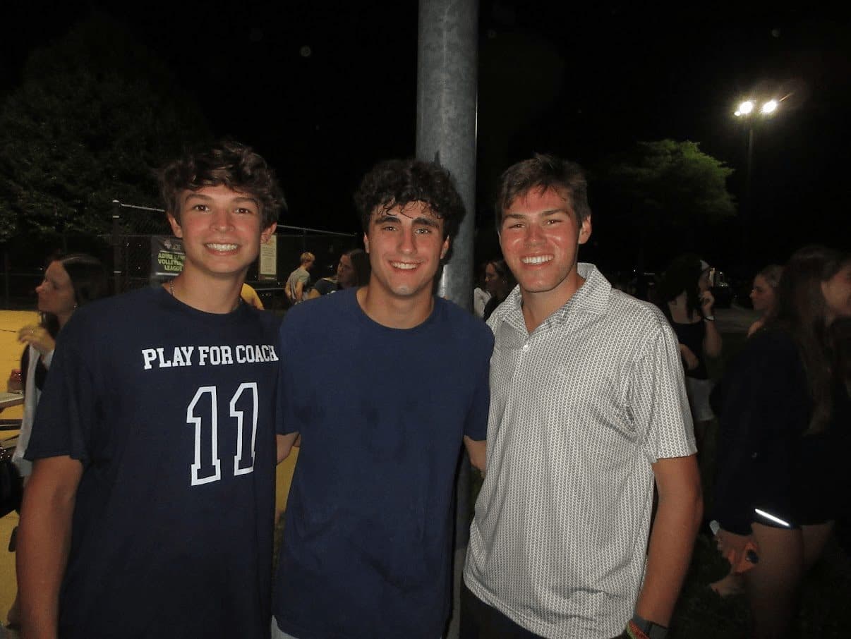 Jeffrey with two friends at the courts after an evening game